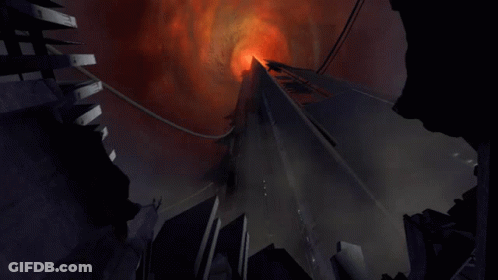 Tall Building With Red Light GIF