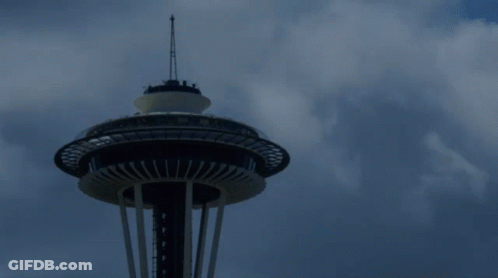 Tall Tower With Cloudy Sky GIF
