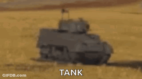 Tank Driving Through Field GIF