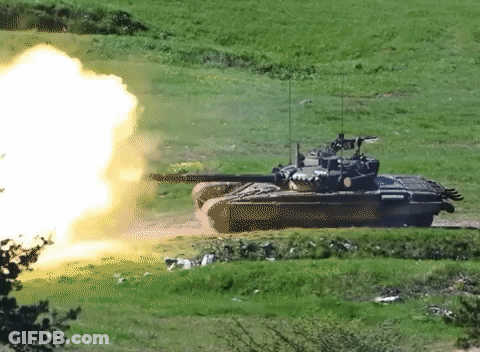 Tank Firing Rocket In Grass Field GIF