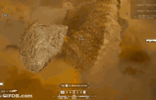Tanker Truck Going Over Large Rock GIF