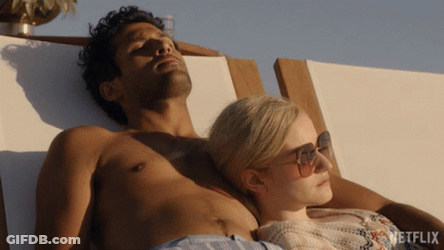 Tanning And Enjoying The Sea Breeze GIF
