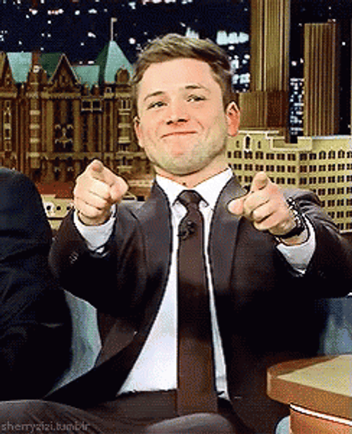 Taron Egerton Happily Pointing Fingers At You GIF
