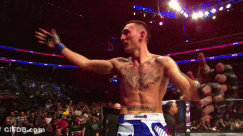 Tattooed Man In Boxing Ring GIF