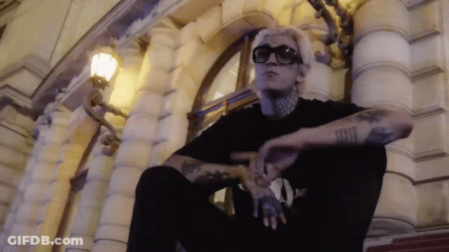 Tattooed Man Smoking Cigarette GIF