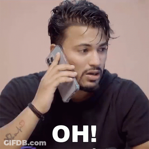 Tattooed Man Talking On Cell Phone Oh GIF