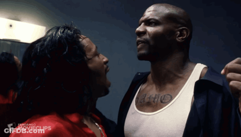 Tattooed Man Talking To Another In Movie Clip GIF