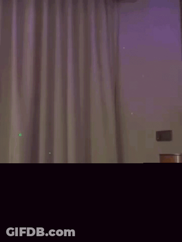 Tattooed Person Cutting Paper With Knife GIF