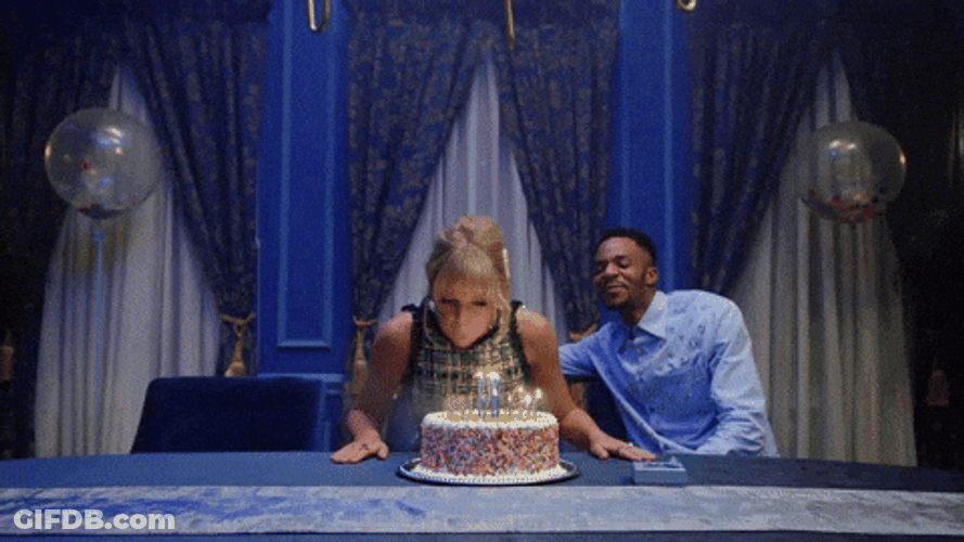 Taylor Swift Blows Lover Birthday Cake GIF