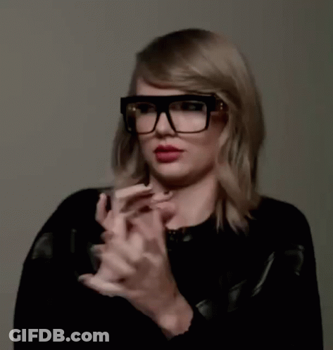Taylor Swift Clapping In Glasses And Black Jacket GIF