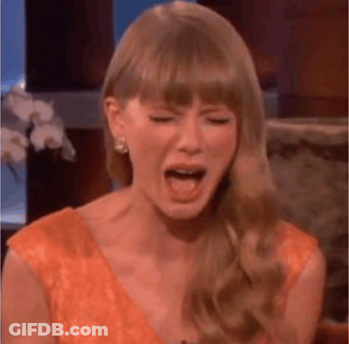 Taylor Swift Crying On Talk Show In Orange Dress GIF