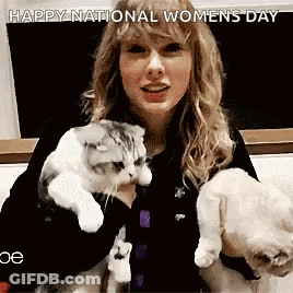 Taylor Swift Holding Two Cats And A Puppy GIF
