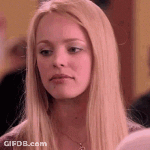 Taylor Swift In Black Off The Shoulder Top Looking At Camera GIF
