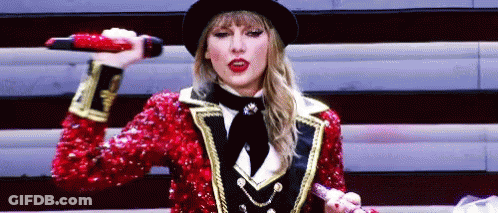 Taylor Swift In Red Sequined Jacket Singing GIF