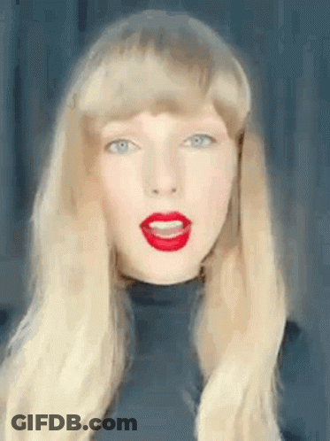 Taylor Swift In Wig And Red Lipstick GIF