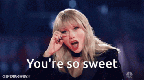 Taylor Swift Says " You 'Re So Sweet " While Holding Her Hand To Her Face GIF
