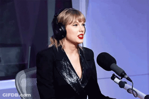 Taylor Swift Singing Into Microphone With Headphones GIF