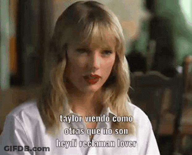 Taylor Swift Tongue Sticking Out Meme GIF