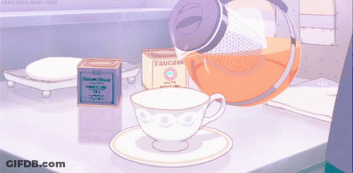 Tea Poured Into Saucer Next To Fauchon Box GIF
