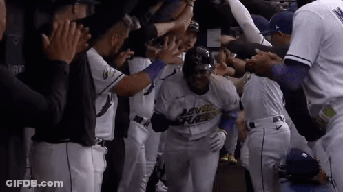Teammates Congratulate Baseball Player After Home Run GIF