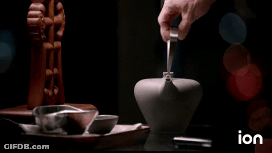 Teapot Water Pouring In Small Bowl GIF