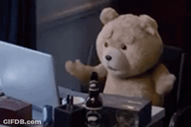 Ted In Front Of Desk GIF