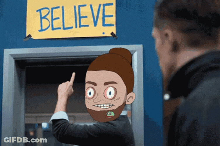 Ted Lasso Animated Head Pointing Believe Sign GIF
