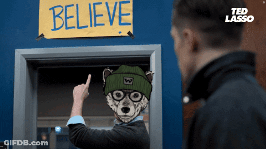 Ted Lasso Animated Wolf Head Points Believe Sign GIF
