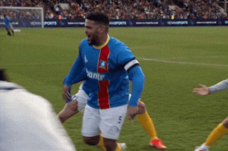 Ted Lasso Players Running Backward GIF