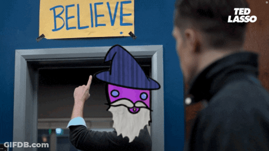 Ted Lasso Wizard Head Points Believe Sign GIF
