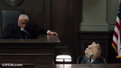 Teddy Bear At Courtroom Microphone GIF