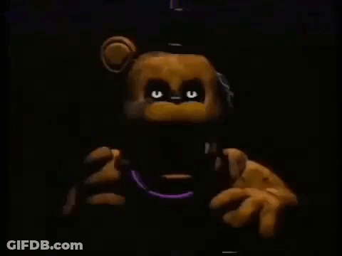 Teddy Bear Close Up Glowing Eyes Dark Room GIF