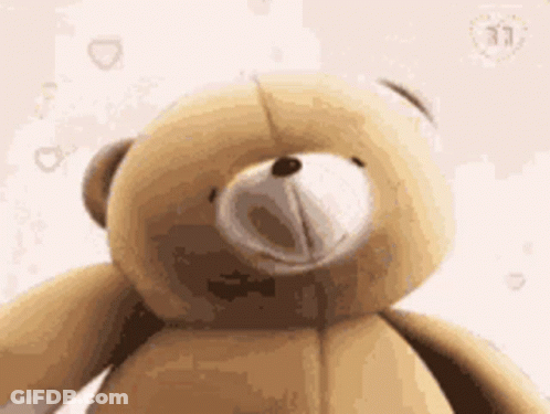 Teddy Bear Close Up With Hearts GIF