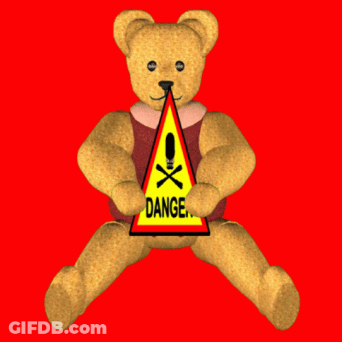 Teddy Bear Holding Danger Skull Sign GIF