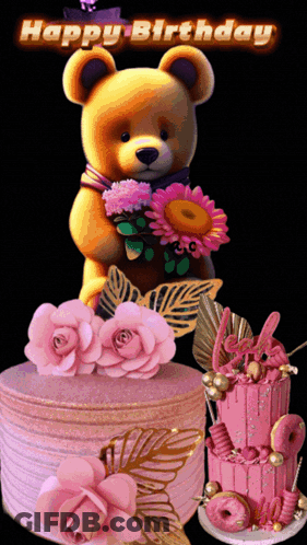 Teddy Bear Holding Flowers Next To Pink Cake GIF