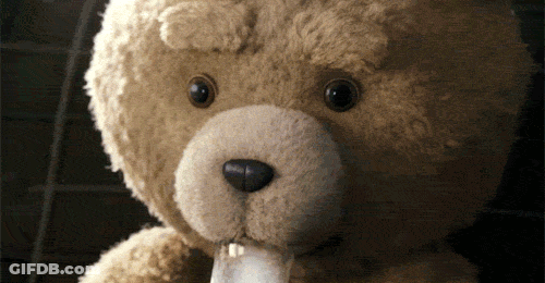 Teddy Bear Holding Paper GIF