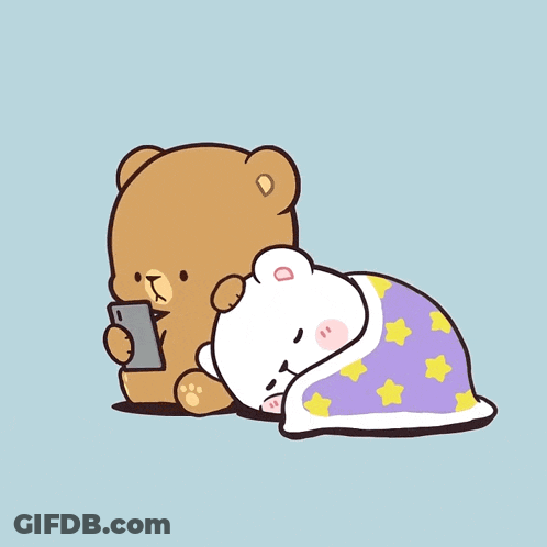 Teddy Bear Holding Phone Next To Sleeping Bear GIF