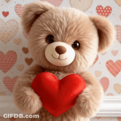 Teddy Bear Holding Red Heart On Heart Wall GIF