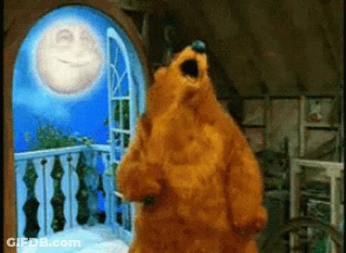 Teddy Bear In Front Of Window With Smiling Moon GIF