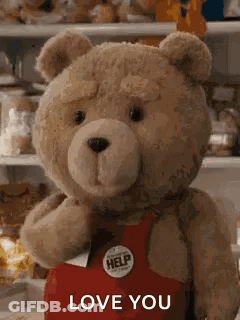 Teddy Bear In Red Apron Saying Love You GIF