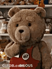 Teddy Bear In Red Apron With Help Button GIF