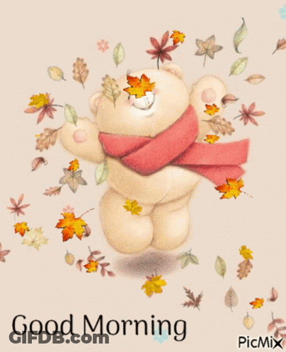 Teddy Bear In Scarf Surrounded By Autumn Leaves Saying Good Morning GIF