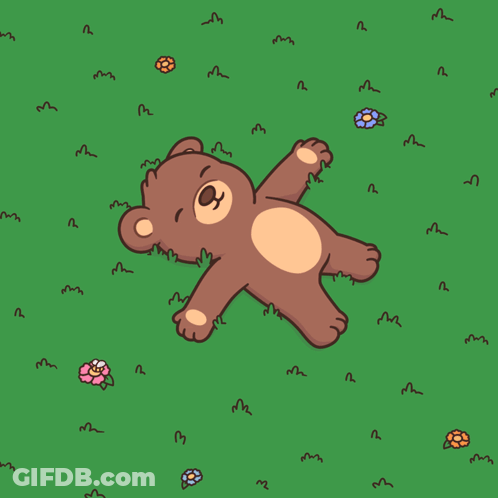 Teddy Bear Laying In Grass With Flowers And Butterflies GIF