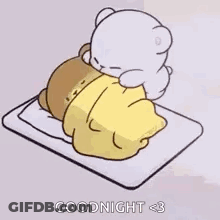 Teddy Bear Laying On Bed With Blanket GIF
