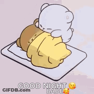 Teddy Bear Laying On Bed With Blanket GIF