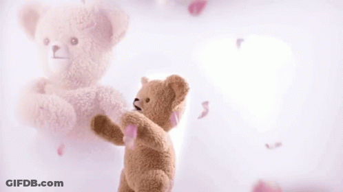 Teddy Bear On Pink Background With Falling Petals GIF