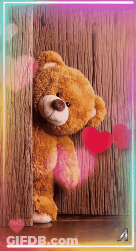 Teddy Bear Peeking Behind Wall GIF