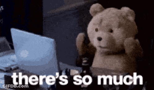 Teddy Bear Sitting At Desk With Laptop GIF