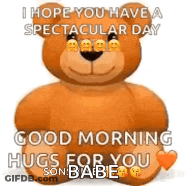 Teddy Bear Sitting On Bed With Good Morning Hugs GIF