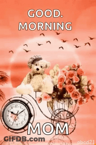 Teddy Bear Sitting On Bicycle With Flowers And Clock GIF